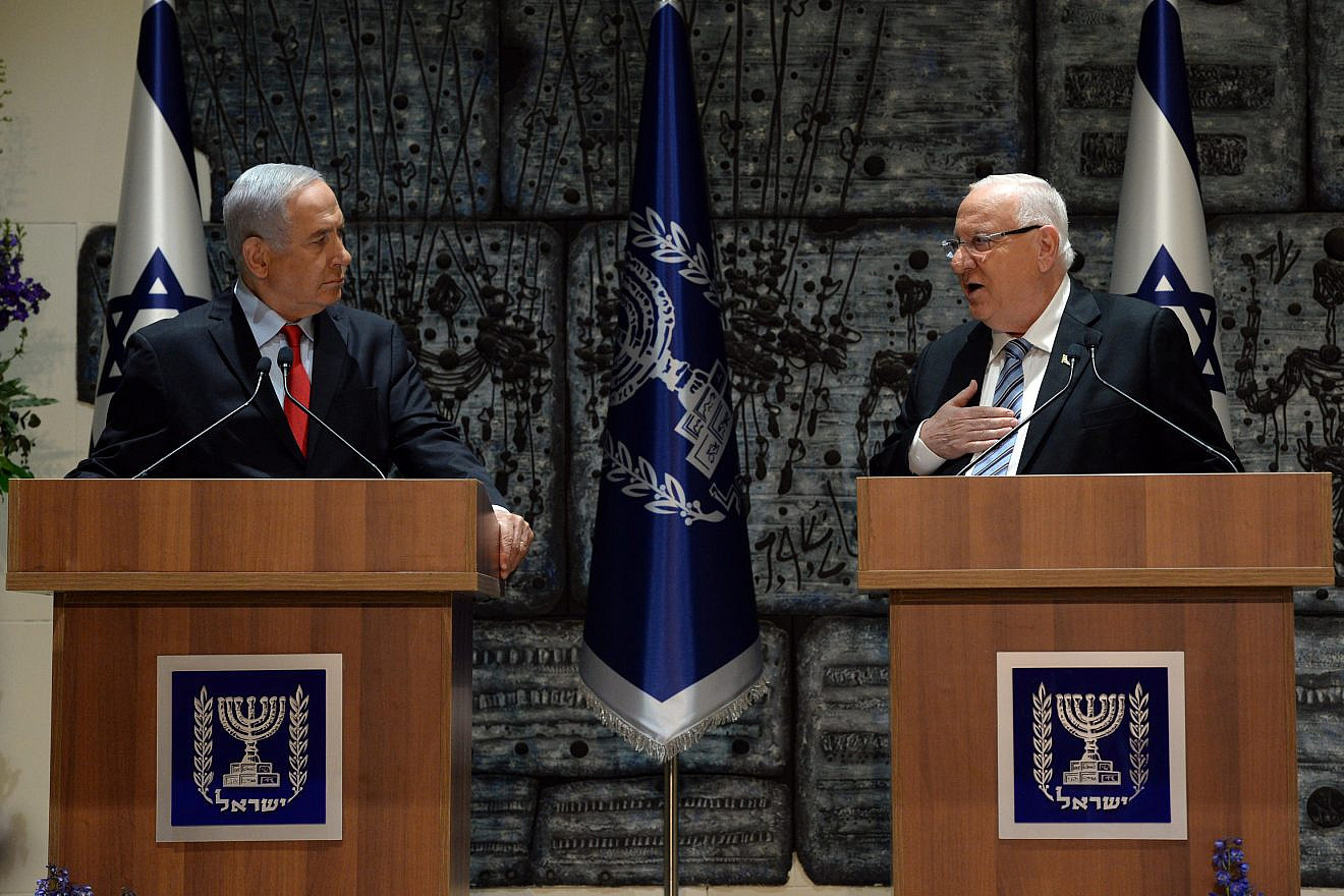 Israeli President Reuven Rivlin (right) tasks Israeli Prime Minister Benjamin Netanyahu on April 17, 2019, with forming a government coalition. Credit: Haim Zach/GPO.