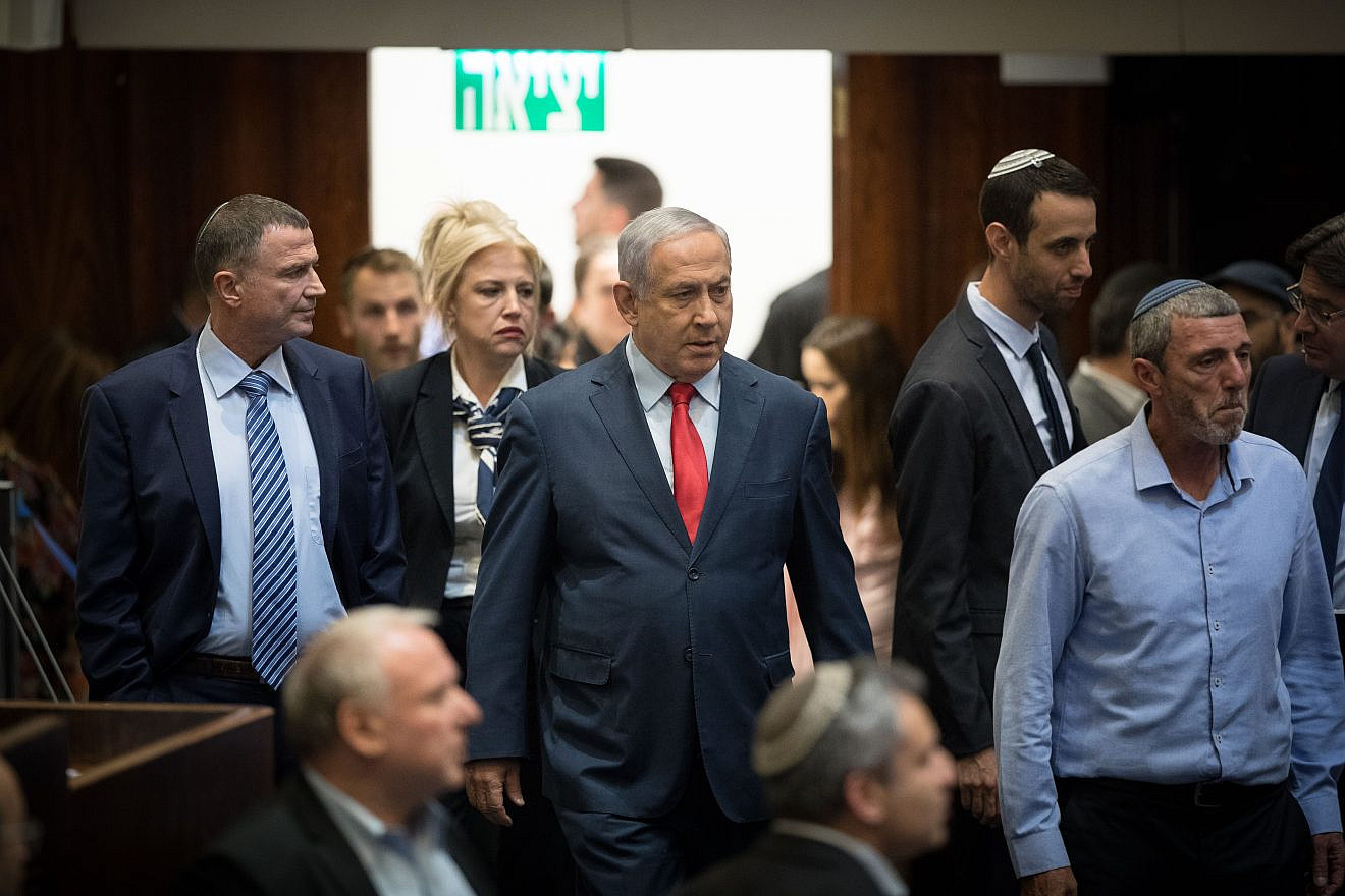 Israeli Prime Minister Benjamin Netanyahu with Israeli parliament members during a vote on a bill to dissolve the Knesset in Jerusalem on May 29, 2019. Credit: Yonatan Sindel/Flash90.
