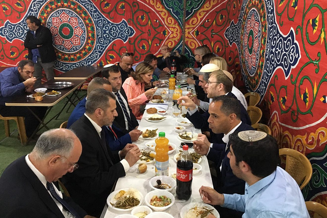 Palestinian businessman Sheikh Ashraf Al Jabari, co-founder of the Judea and Samaria Chamber of Commerce, hosting a kosher Iftar with Jewish neighbors near Hebron, May 2019. Credit: Facebook.