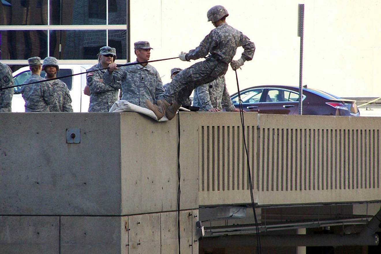 Reserve Officers Training Corps members practice rappelling at the University of Michigan on Sept. 30, 2010. Credit: Wikimedia Commons.