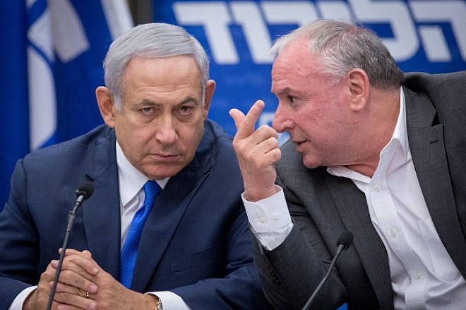 Prime Minister Benjamin Netanyahu and then-coalition whip David Amsalem during a Likud faction meeting in the Knesset on Nov. 19, 2018. Photo by Miriam Alster/Flash90.