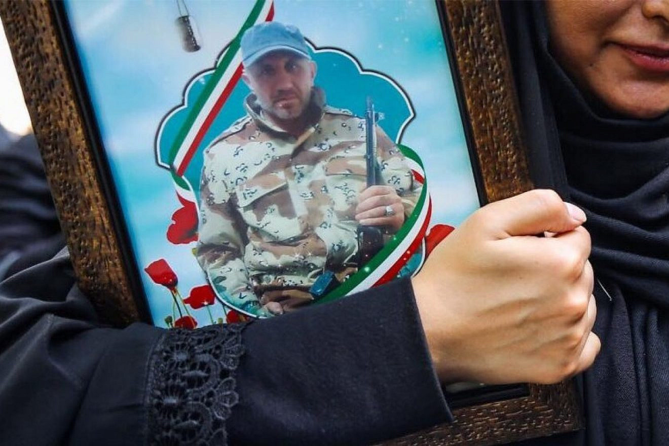 A photograph of Iranian Islamic Revolutionary Guard Corps officer Abu Alfazl Sarabian is displayed at a funeral service in Tehran before Sarabian’s body was returned for burial in his hometown of Kermanshah. Source: Iranian Press.