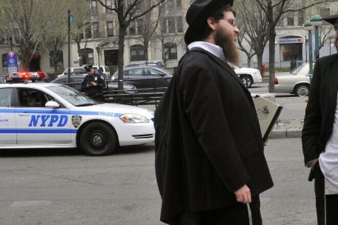 Jews in the Crown Heights neighborhood of Brooklyn, N.Y. Photo by Serge Attal/Flash90.