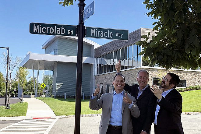 From left: Mayor of Livingston, N.J., Alfred Anthony, and former mayor and current Town Council member Ed Meinhardt join CEO of LifeTown Rabbi Zalman Grossbaum in welcoming the new “Miracle Way” street sign in Esssex County, N.J. on Aug. 29, 2019. Credit: Courtesy.