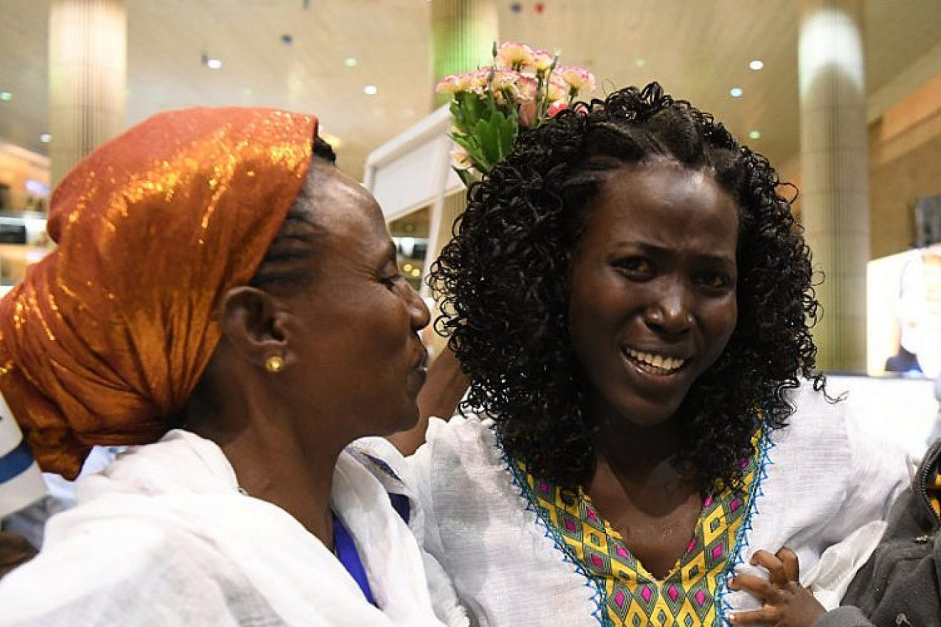 Suzy Markorie (right) and her mother are reunited at Ben-Gurion International Airport on Aug. 20, 2019. Photo by Yossi Zeliger.