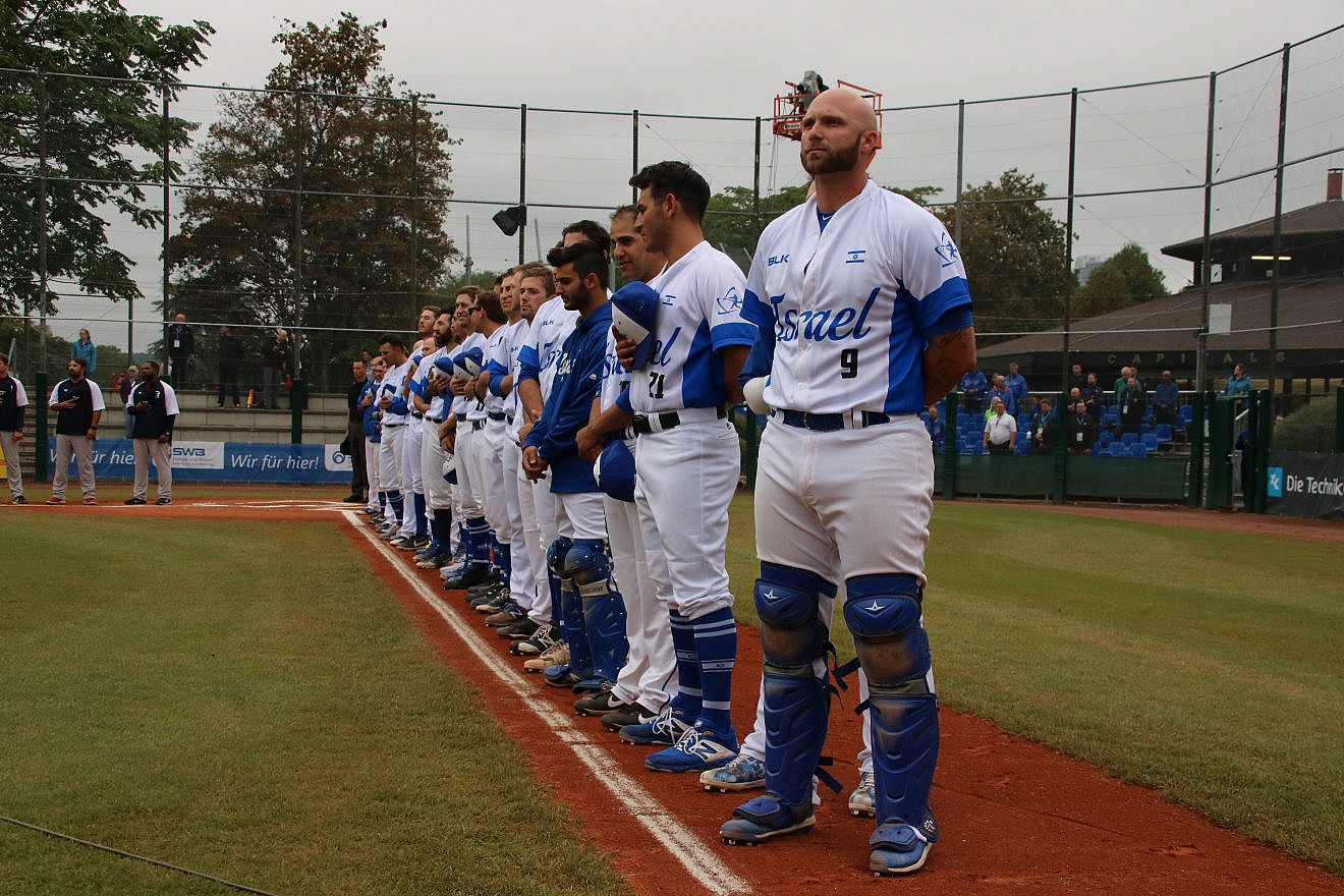 Players for Team Israel stand for the national anthem during a game in the European Championships. Photo by Margo Sugarman.