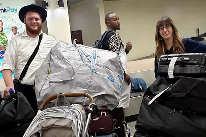 Rabbi Chaim and Dina Bar Sella arrive in Rwanda to open a new Chabad center in Kigali that will include the country’s first synagogue, with Bar Sella as its first permanent rabbi. Credit: Chabad.org/News.
