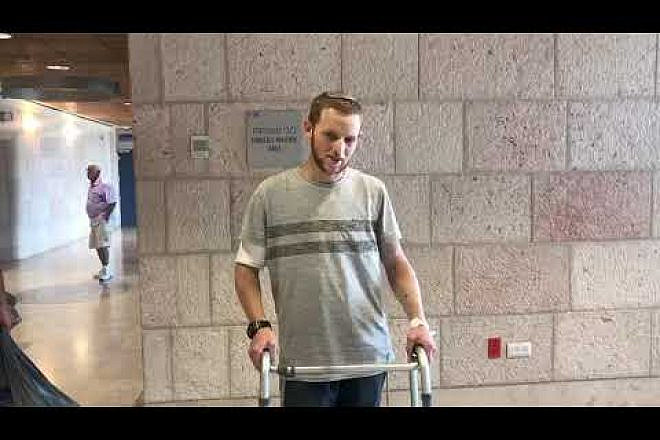 Dvir Shnerb, 19, who was seriously wounded in a terrorist bombing near in Samaria, leaves Hadassah Ein Kerem Hospital in Jerusalem on Sep. 2, 2019. Credit: Screenshot.
