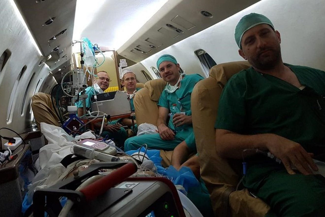 Four Israeli heart specialists from the Sheba Medical Center at Tel Hashomer en route to a hospital in Cyprus with life-saving technology to save a woman who was suffering cardiac issues following childbirth. Credit: Courtesy of SACH.