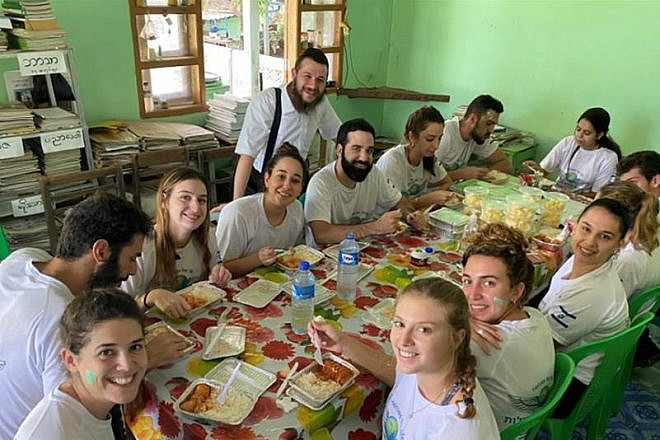 Rabbi Schneur Raitport hosts a group of visitors from Israel at the new Chabad center in Yangon, Myanmar. Credit: Chabad.org/News.