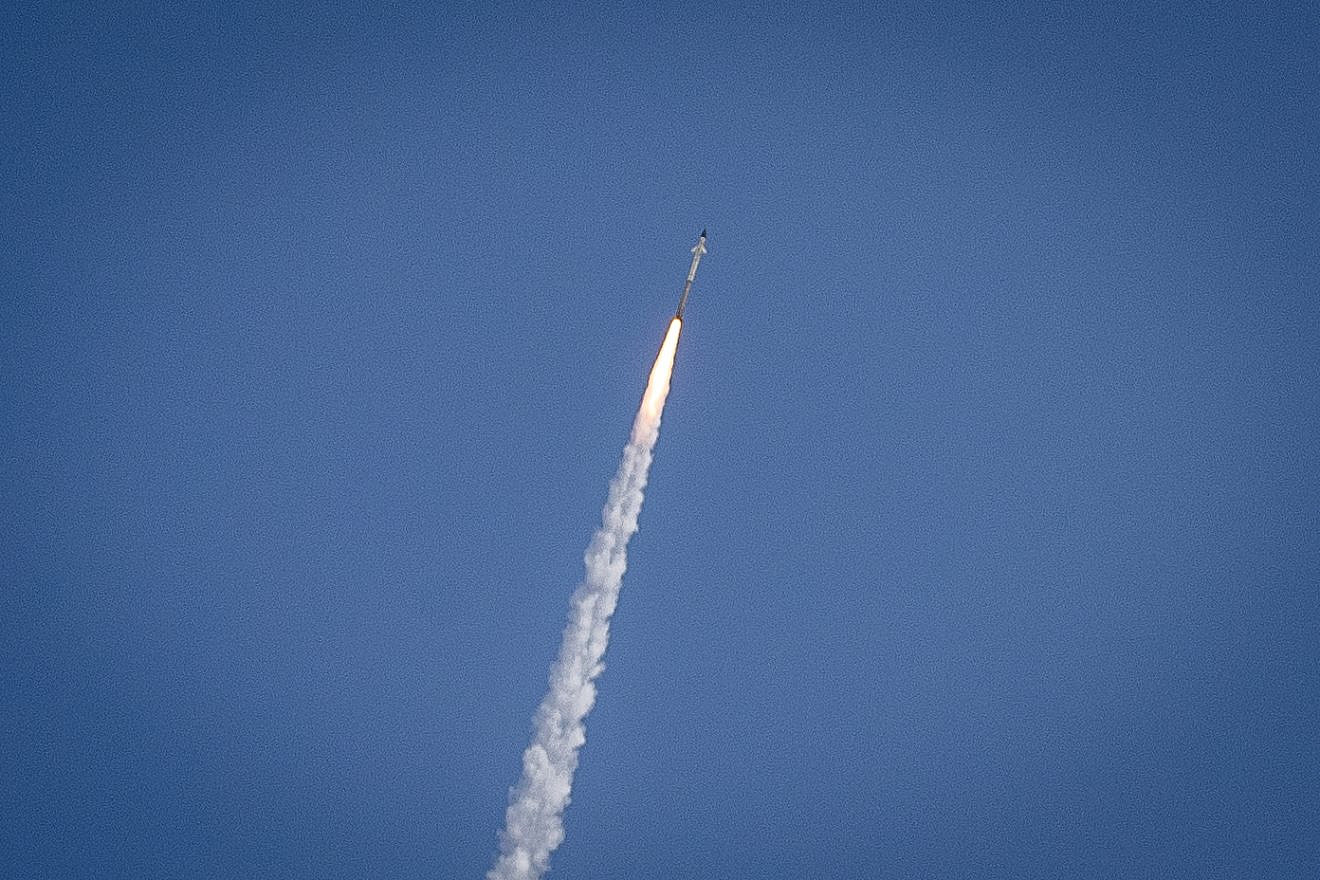Smoke trails are seen as rockets launched from the Gaza Strip are intercepted by the Israeli Iron Dome air-defense system on Nov. 13, 2019. Photo by Yonatan Sindel/Flash90.