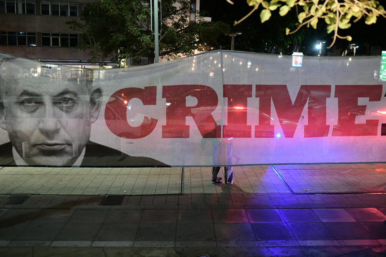 Left-wing activists protest against Israeli Prime Minister Benjamin Netanyahu in Tel Aviv, Nov. 23, 2019. Photo by Tomer Neuberg/Flash90.