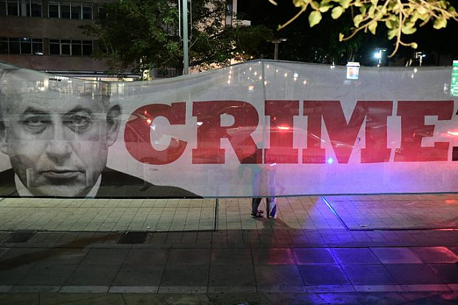 Left-wing activists protest against Israeli Prime Minister Benjamin Netanyahu in Tel Aviv, Nov. 23, 2019. Photo by Tomer Neuberg/Flash90.