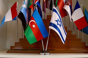 Israeli and Azerbaijani flags at the Baku Summit of World Religious Leaders. Credit: Akos Nagy. 