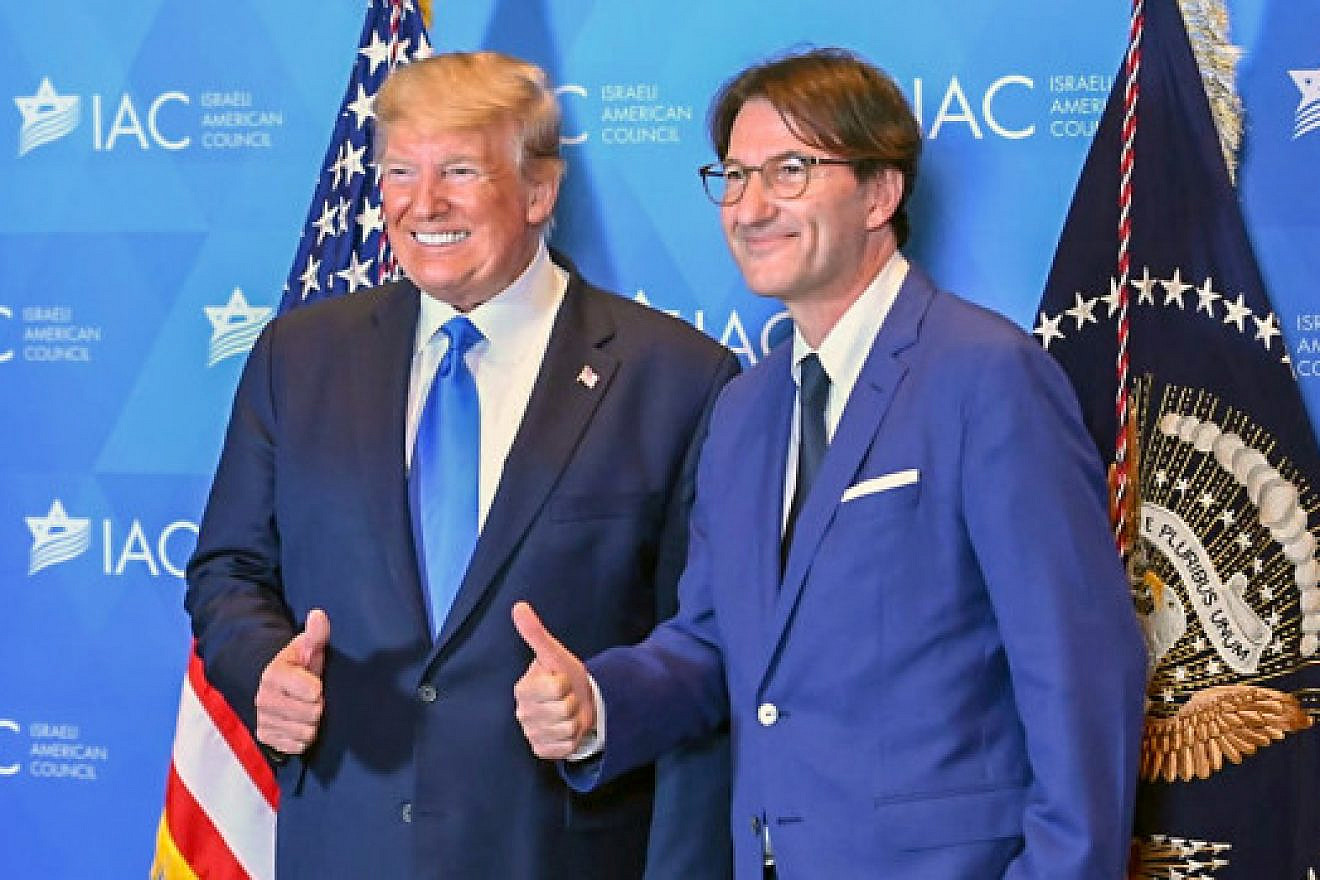 U.S. President Donald Trump with "Israel Hayom" editor-in-chief Boaz Bismuth at the IAC summit in Hollywood, Fla. Credit: Israel Hayom.