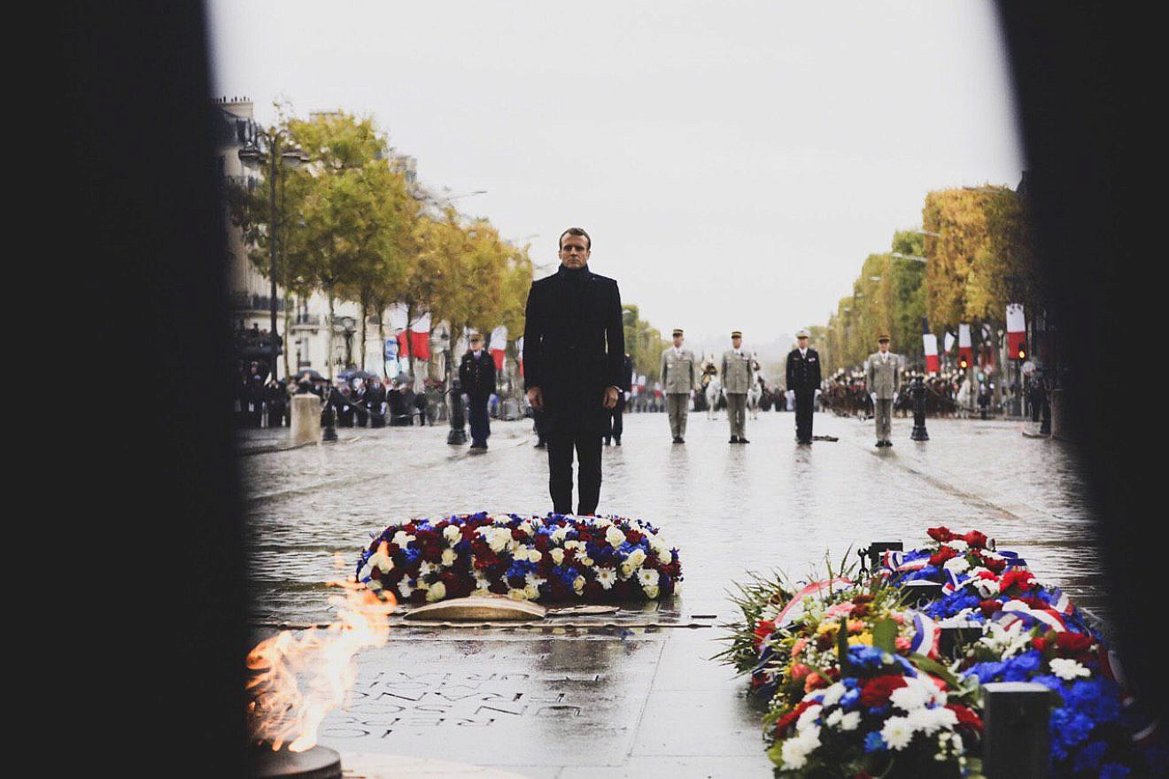 French President Emmanuel Macron paying his respect to fallen French soldiers from World War I. Source: Emmanuel Macron via Twitter.