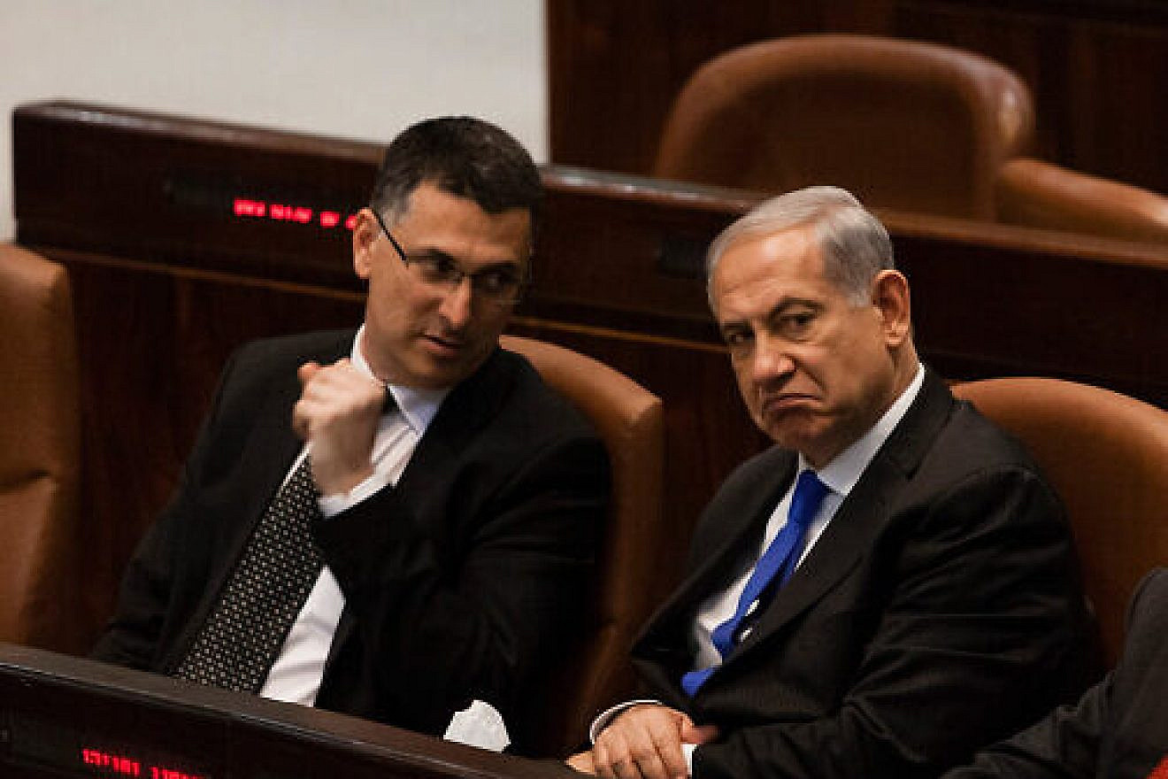 Israeli Prime Minister Benjamin Netanyahu and Internal Affairs Minister Gideon Sa’ar attend a special session marking a year since the death of former Prime Minister Yitzhak Shamir, at the Knesset, on July 9, 2013. Photo by Flash90.