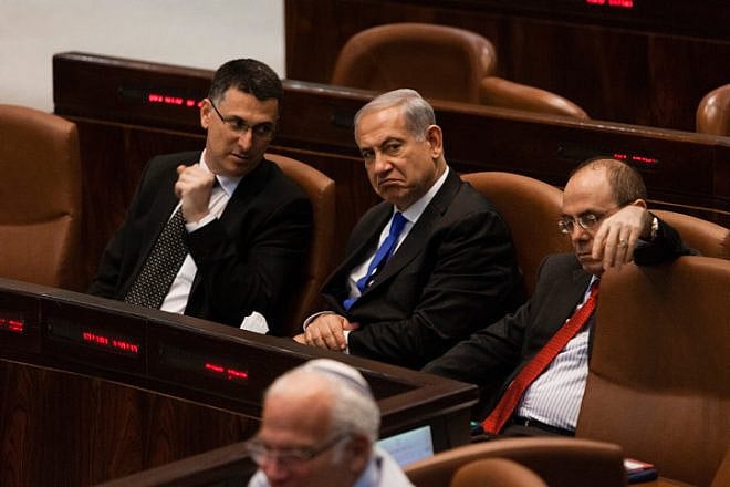 From left, Interior Minister Gideon Sa'ar, Prime Minister Benjamin Netanyahu and Regional Development Minister Silvan Shalom attend a special Knesset session in Jerusalem on July 9, 2013. Credit: Flash90.