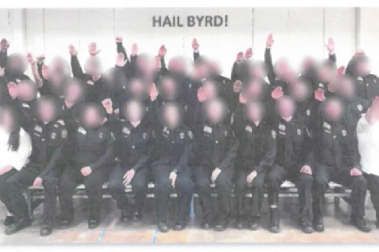 More than 30 West Virginia corrections’ workers and cadets have been fired after a photo surfaced of them performing a Nazi salute. Source: Screenshot.