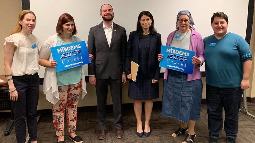 Michigan Democratic Jewish Caucus founder and chair Noah Arbit (far right) with supporters. Source: Michigan Democratic Jewish Caucus/Facebook.