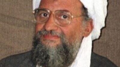 Ayman al-Zawahri in a photo taken by Hamid Mir, who snapped it during his third and last interview with Osama bin Laden in November 2001 in Kabul, the capital of Afghanistan. Al-Zawahri was present in this interview and acted as bin Laden's translator. Credit: Wikipedia.