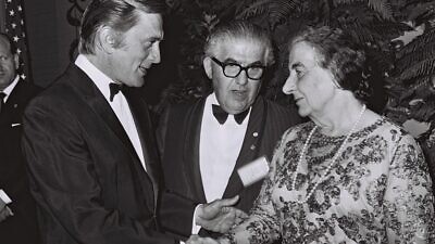 Kirk Douglas greeting former Israeli Prime Minister Golda Meir at a gala banquet at the Beverly Hilton in Los Angeles in 1969. Photo by Milner Moshe/GPO.