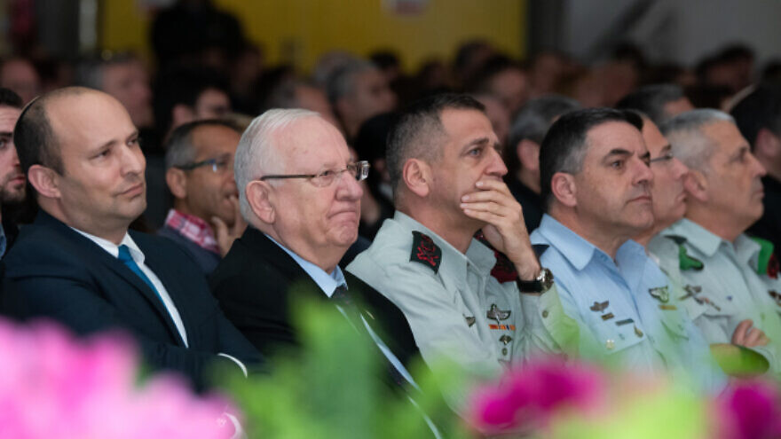 From left: Israeli Defense Minister Naftali Bennett, President Reuven Rivlin and IDF Chief of Staff Lt. Gen. Aviv Kochavi attend a ceremony in northern Israel marking the 23rd anniversary of the 1997 Israeli helicopter disaster, in which 73 IDF soldiers died, Feb. 11, 2020. Photo by Basel Awidat/Flash90.