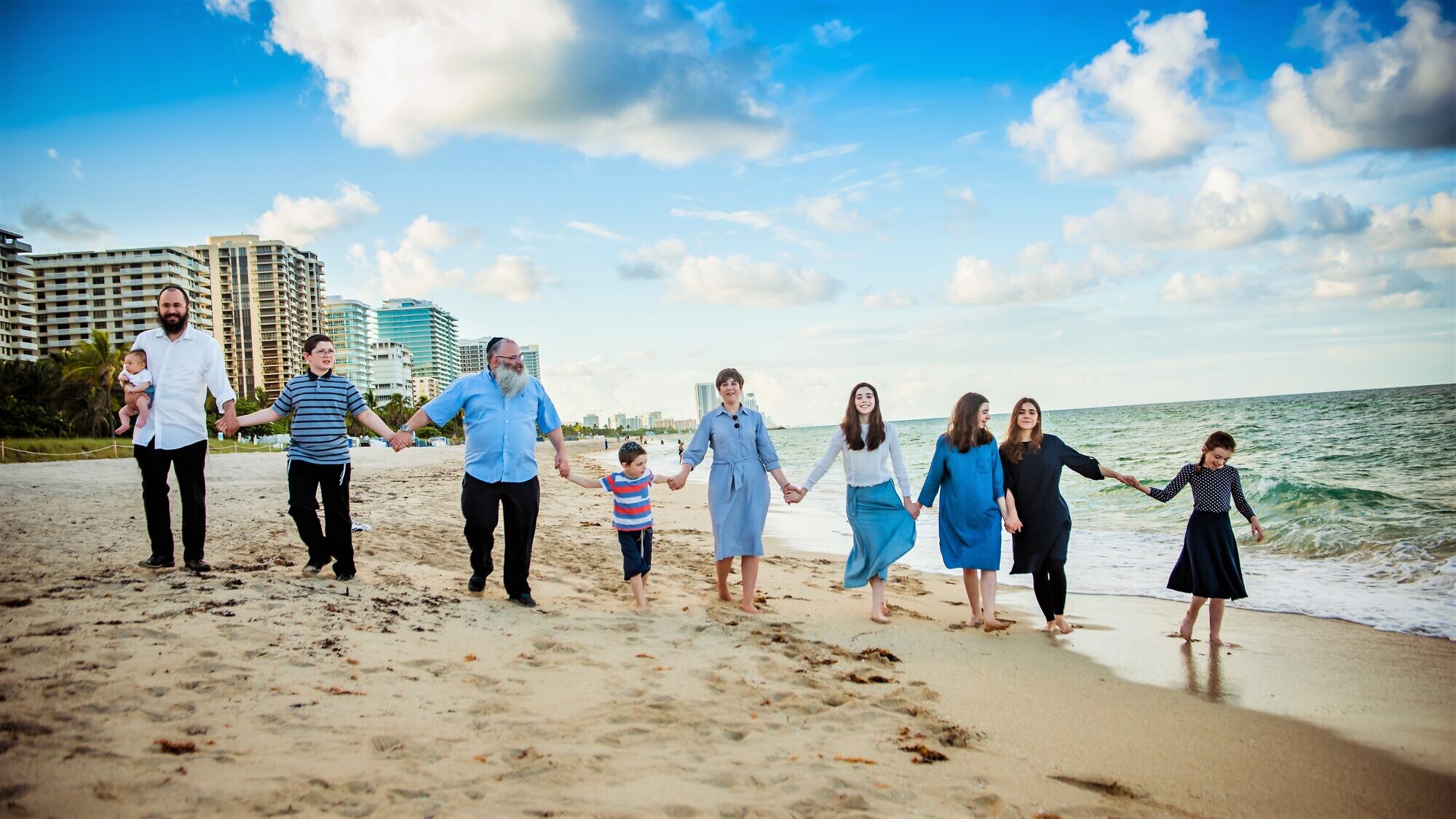 The Freundlich family: Dini Freundlich (center) will serve as the keynote speaker at the Feb. 16, 2020 gala banquet that concludes the International Conference of Chabad-Lubavitch Women Emissaries (Kinus Hashluchos) in Brooklyn, N.Y. Credit: Chabad Lubavitch of Beijing.