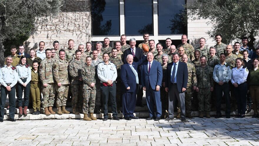 Israel’s President Reuven Rivlin poses with some  some 30 officers from the U.S. Army, Navy, Air Force and Marines. Photo by Kobi Gideon/GPO.