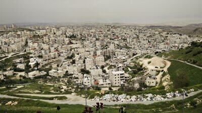 The capital's Issawiya neighborhood, seen from the Hebrew University of Jerusalem's Mount Scopus campus, April 5, 2016. Credit: Hidro via Wikimedia Commons.