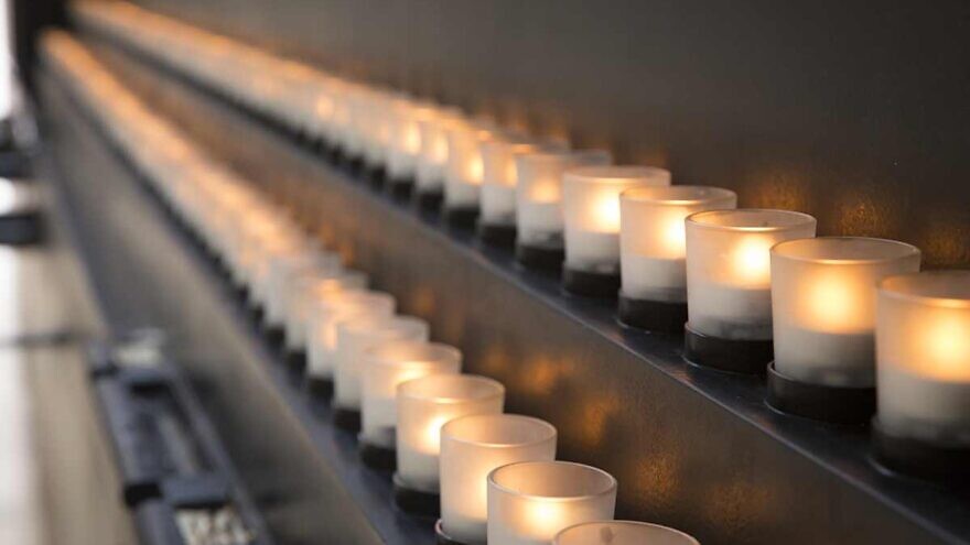 Candles lit in remembrance of the Holocaust. Credit: United States Holocaust Memorial Museum.