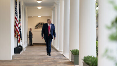 U.S. President Donald Trump returns to the Oval Office following a White House Coronavirus Task Force update briefing on March 29, 2020, at the White House. Official White House Photo by Andrea Hanks.