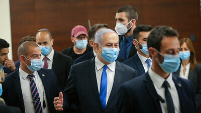 Israeli Prime Minister Benjamin Netanyahu at the Knesset in Jerusalem after presenting the country's 35th government, on May 17, 2020. Photo by Alex Kolomoisky/POOL.