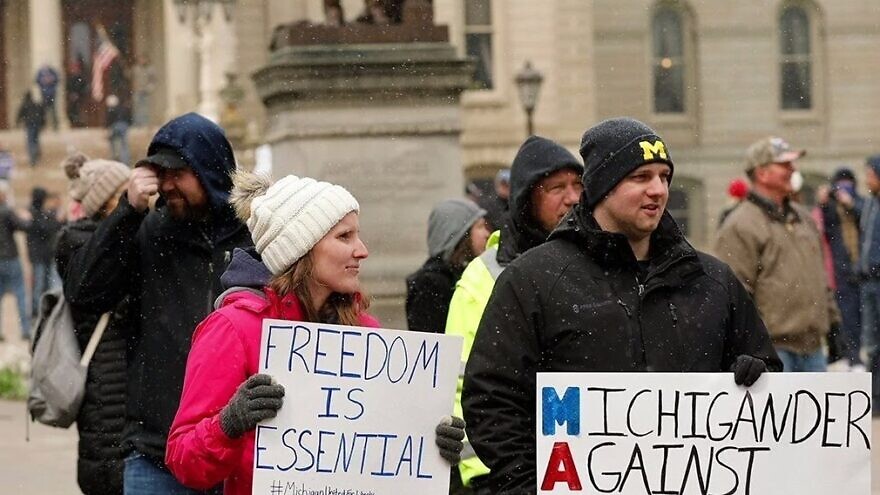 Protesters in Michigan against current lockdown measures put in place by the governor's office to prevent the spread of the coronavirus. Source: YouTube.