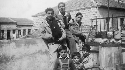 Banai family on the rooftop of 13 Agas St., Jerusalem, 1949. Credit: Yad Izhak Ben-Zvi Photographic Archives.