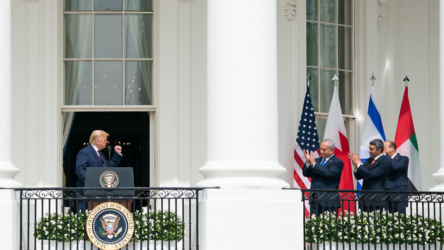 U.S. President Donald Trump, Minister of Foreign Affairs of Bahrain Dr. Abdullatif bin Rashid Al-Zayani, Israeli Prime Minister Benjamin Netanyahu and Minister of Foreign Affairs for the United Arab Emirates Abdullah bin Zayed Al Nahyanisigns sign the Abraham Accords on Sept. 15, 2020, on the South Lawn of the White House. Credit: Official White House Photo by Joyce N. Boghosian.
