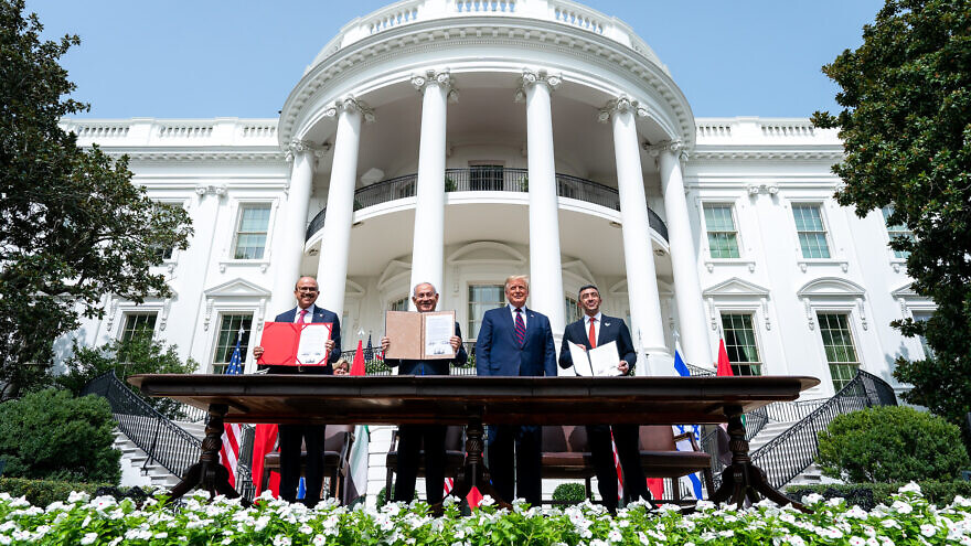 Then-U.S. President Donald Trump, Bahrain Foreign Minister Abdullatif bin Rashid Al Zayani, Israeli Prime Minister Benjamin Netanyahu and UAE Foreign Minister Abdullah bin Zayed Al Nahyan sign the Abraham Accords on the South Lawn of the White House, Sept. 15, 2020. Credit: White House/Tia Dufour.