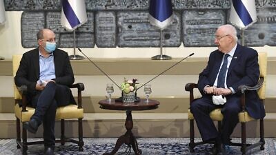 Justice Minister Avi Nissenkorn (left) with Israeli President Reuven Rivlin at Beit Hanassi (the President's House) on Sept. 22, 2020. Photo by Mark Neyman/GPO.