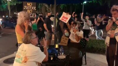 Black Lives Matter protesters accost a pair of elderly diners in St. Petersburg, Fla., on Sept. 23, 2020. Source: Screenshot.