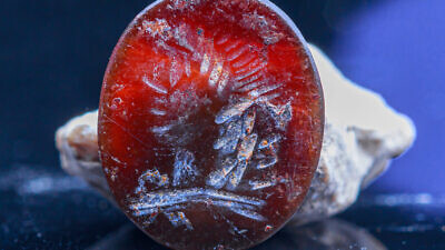 This 2,000-year-old gem seal bearing the image of Apollo was found in earth excavated from the foundations of the Western Wall in the Old City of Jerusalem. Photo by Eliyahu Yanai-City of David.