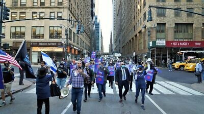 Supporters of the End Jew Hatred movement hold a rally in New York City to protest new coronavirus restrictions enacted by Gov. Andrew Cuomo and Mayor Bill de Blasio, Oct. 15, 2020. Credit: Courtesy.