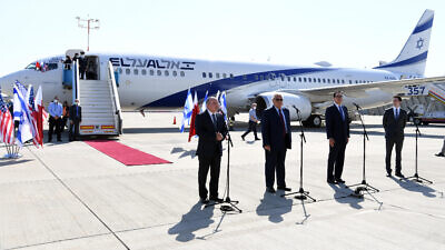 From left: Israeli National Security Adviser Meir Ben-Shabbat, U.S. Ambassador to Israel David Friedman, U.S. Treasury Secretary Steven Mnuchin and Special Representative for International Negotiations Avi Berkowitz on the tarmac at Ben Gurion International Airport in Tel Aviv, before boarding El Al Flight 973 to Manama, Bahrain, Oct. 18, 2020. Photo: Haim Zach/GPO.