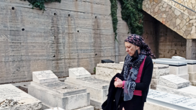 Friemet Roth visits her daughter Malki's grave, on what would have been her 35th birthday. Nov. 2020. Credit: Courtesy.