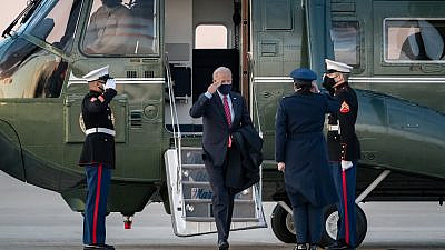 U.S. President Joe Biden salutes as he disembarks Marine One at Joint Base Andrews, Md., prior to boarding Air Force One to begin his flight to New Castle County Airport in New Castle, Del., on Feb. 5, 2021. Credit: Official White House Photo by Carlos Fyfe.