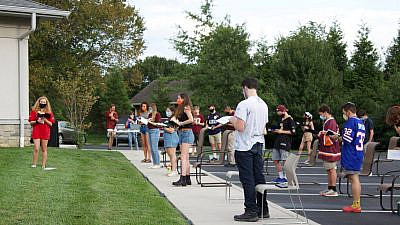Students gather for an outdoor service at Hillel at Virginia Tech. Credit: Hillel at Virginia Tech via Facebook.