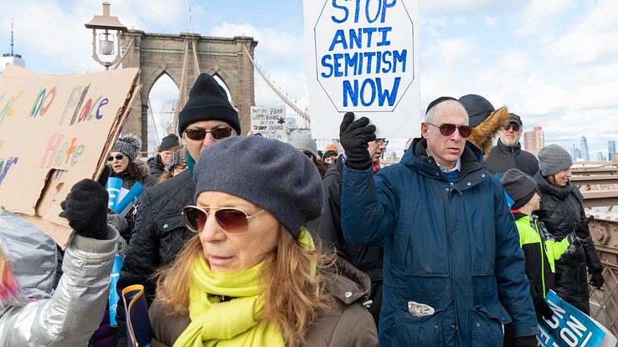 Thousands of people cross the Brooklyn Bridge as part of the “No Hate, No Fear” Jewish Solidarity March in January 2020 in response to anti-Semitic attacks in and around New York City. Credit: Lev Radin/Shutterstock.