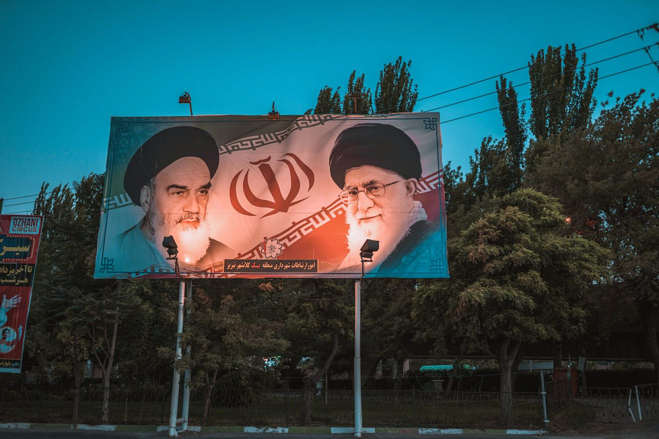 A billboard displaying Iranian Ayatollahs Ruhollah Khomeini and Ali Khamenei. Credit: Erdalislakphotography/Shutterstock.
