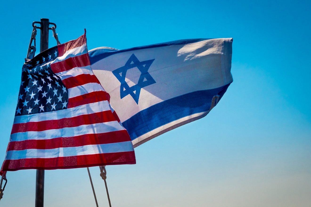 American and Israeli flags flying together. Credit: John Theodor/Shutterstock.