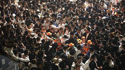 United Hatzalah emergency-service workers attempt to evacuate the injured in Meron in northern Israel after Jewish worshippers were crushed during Lag B’Omer festivities, April 30, 2021. Credit: United Hatzalah.