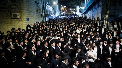 Haredi Jews attend the funeral of Yousef Kahn, one of the victims of the Meron tragedy, where 45 people were crushed to death on April 30 outside the Mir Yeshiva in Jerusalem, May 2, 2021. Photo by Noam Revkin Fenton/Flash90.
